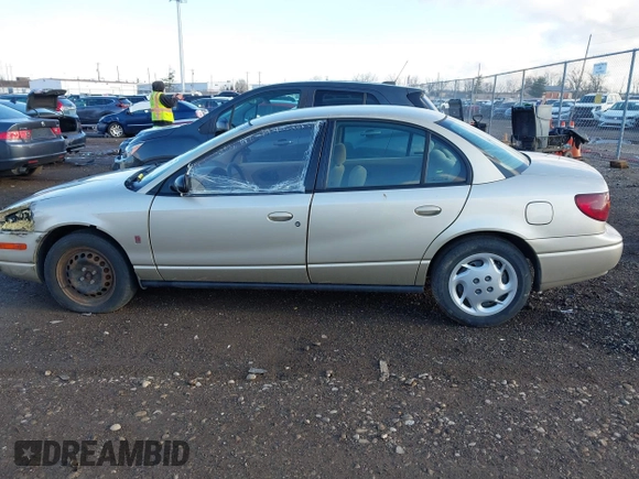 2002 Saturn SL with VIN 1G8ZK52752Z194235, listed as a IAAI auction lot 41792837 with 152,337 mi miles. Bid and sale history available at carsss.com. Image 14.