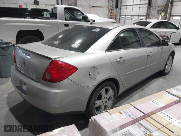 2005 Pontiac G6 GT with VIN 1G2ZH528854167162, listed as a IAAI auction lot 40973635 with 207,742 mi miles. Bid and sale history available at carsss.com. Image 4.