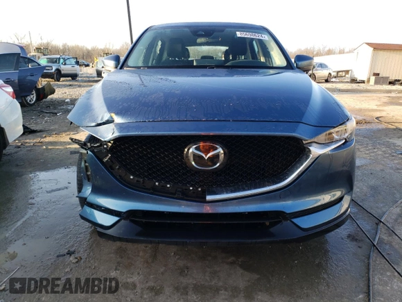 2021 Mazda CX-5 Sport with VIN JM3KFABM1M0406640, listed as a Copart auction lot 85698624 with 31,267 mi miles and Salvage Title. Bid and sale history available at carsss.com. Image 5.