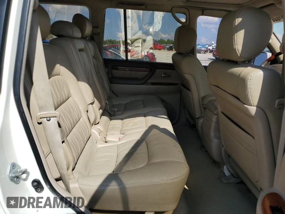 1999 Lexus LX 470 z VIN JT6HT00W1X0074382, wystawiony jako Copart lot #53612205 z przebiegiem 256 689 mil mil oraz Szkoda całkowita • Salvage title. Historia ofert i sprzedaży dostępna na DreamBid. Obrazek 11.