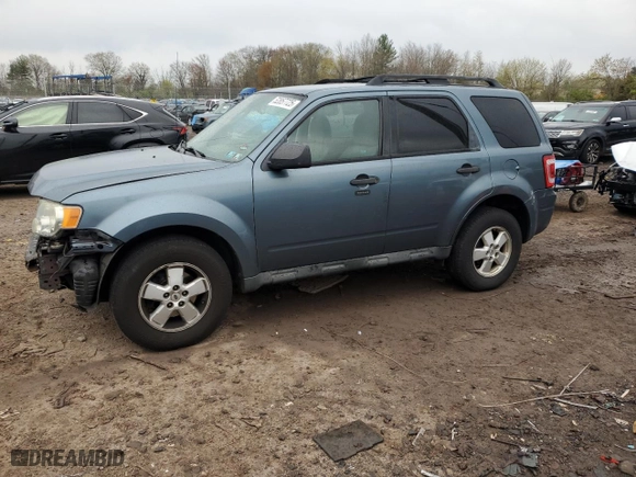 2010 Ford Escape XLT with VIN 1FMCU0D74AKD01784, listed as a Copart auction lot 52857725 with 119,448 mi miles and Salvage Title. Bid and sale history available at carsss.com. Image 1.