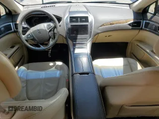 2013 Lincoln MKZ z VIN 3LN6L2GK4DR817557, wystawiony jako Copart lot #60876995 z przebiegiem 77 303 mil mil oraz Szkoda całkowita • Salvage title. Historia ofert i sprzedaży dostępna na DreamBid. Obrazek 8.