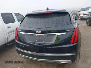 2021 Cadillac XT5 FWD Premium Luxury with VIN 1GYKNCRS2MZ185678, listed as a IAAI auction lot 41143084 with 25,399 mi miles and . Bid and sale history available at carsss.com. Image 16.