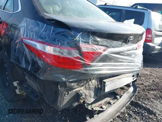 2016 Toyota Camry XLE with VIN 4T4BF1FKXGR549361, listed as a IAAI auction lot 41946584 with 221,775 mi miles and . Bid and sale history available at DreamBid. Image 6.