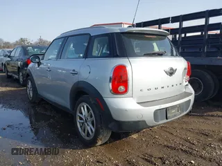 2015 MINI Countryman with VIN WMWZB3C56FWR46360, listed as a IAAI auction lot 41691359 with 88,305 mi miles and . Bid and sale history available at DreamBid. Image 3.