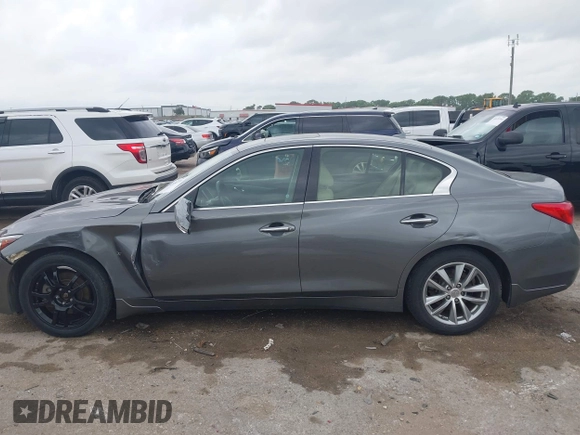2015 Infiniti Q50 Premium z VIN JN1BV7AR9FM413801, wystawiony jako IAAI lot #42134770 z przebiegiem 111 367 mil mil oraz . Historia ofert i sprzedaży dostępna na DreamBid. Obrazek 14.