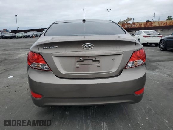 2012 Hyundai Accent GLS z VIN KMHCT4AE9CU187186, wystawiony jako Copart lot #50364835 z przebiegiem 85 638 mil mil oraz Szkody całkowita. Historia ofert i sprzedaży dostępna na DreamBid. Obrazek 6.