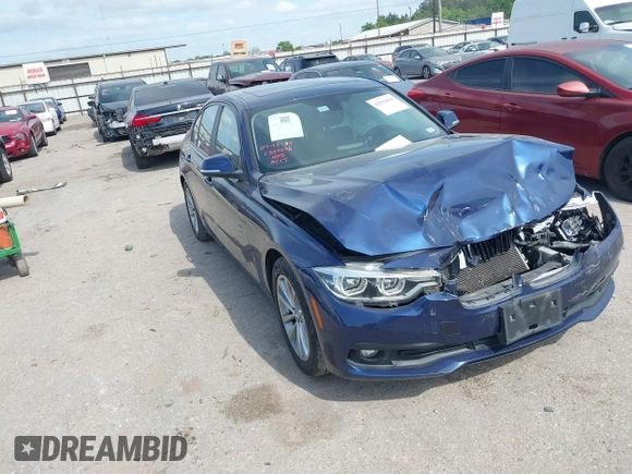 2018 BMW 3 Series 320i with VIN WBA8E1G56JNU92997, listed as a IAAI auction lot 42039869 with 105,085 mi miles. Bid and sale history available at carsss.com. Image 1.