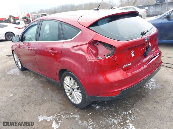 2015 Ford Focus Titanium with VIN 1FADP3N23FL248880, listed as a IAAI auction lot 41474936 with 86,245 mi miles. Bid and sale history available at carsss.com. Image 3.