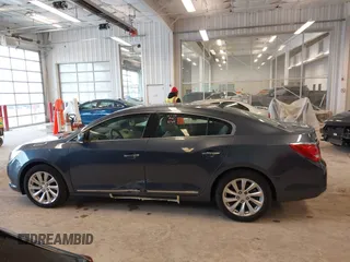 2014 Buick LaCrosse Leather with VIN 1G4GB5G39EF132695, listed as a IAAI auction lot 41728596 with 124,639 mi miles and . Bid and sale history available at DreamBid. Image 14.