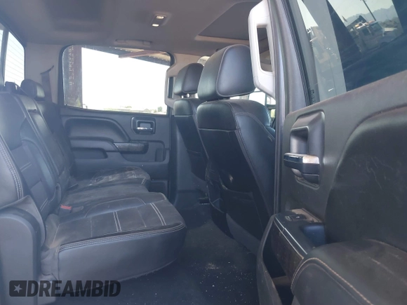 2016 GMC Sierra 2500HD Denali z VIN 1GT12UE85GF157972, wystawiony jako IAAI lot #40659216 z przebiegiem 130 351 mil mil oraz . Historia ofert i sprzedaży dostępna na DreamBid. Obrazek 8.