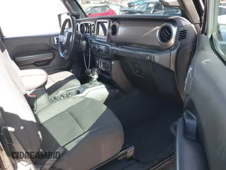 2018 Jeep Wrangler Sport with VIN 1C4GJXANXJW302523, listed as a IAAI auction lot 42527455 with 101,320 mi miles and . Bid and sale history available at DreamBid. Image 5.