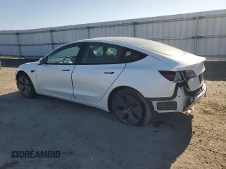 2023 Tesla Model 3 with VIN 5YJ3E1EA1PF556562, listed as a Copart auction lot 48413235 with 11,980 mi miles and Salvage Title. Bid and sale history available at DreamBid. Image 2.