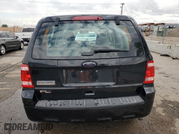 2012 Ford Escape XLS с VIN 1FMCU9C76CKA23687, выставлен на аукционе Copart как лот 55811985 с пробегом 147 845 миль миль и Списание • Salvage title. История ставок и продаж доступна на DreamBid. Изображение 6.