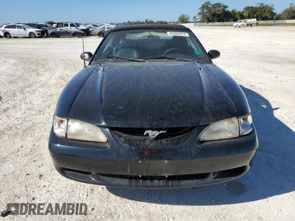 1996 Ford Mustang GT with VIN 1FALP45X3TF204806, listed as a Copart auction lot 84204974 with 137,676 mi miles and Salvage Title. Bid and sale history available at carsss.com. Image 5.