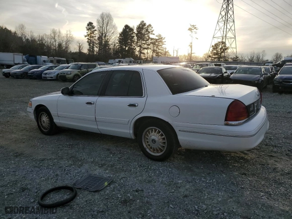 2000 Ford Crown Victoria Police Pkg Police Interceptor with VIN 2FAFP71W9YX101655, listed as a Copart auction lot 84666134 with 180,034 mi miles and Salvage Title. Bid and sale history available at carsss.com. Image 2.