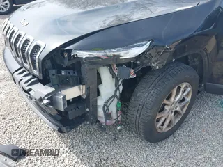 2015 Jeep Cherokee Latitude with VIN 1C4PJLCB3FW517843, listed as a IAAI auction lot 41828715 with 146,862 mi miles and . Bid and sale history available at DreamBid. Image 19.