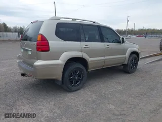 2005 Lexus GX 470 with VIN JTJBT20X450091562, listed as a IAAI auction lot 41771447 with 192,037 mi miles. Bid and sale history available at carsss.com. Image 4.