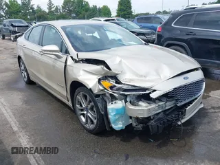 2019 Ford Fusion Titanium с VIN 3FA6P0RU6KR141336, выставлен на аукционе IAAI как лот 42407783 с пробегом 129 399 миль миль и . История ставок и продаж доступна на DreamBid. Изображение 1.