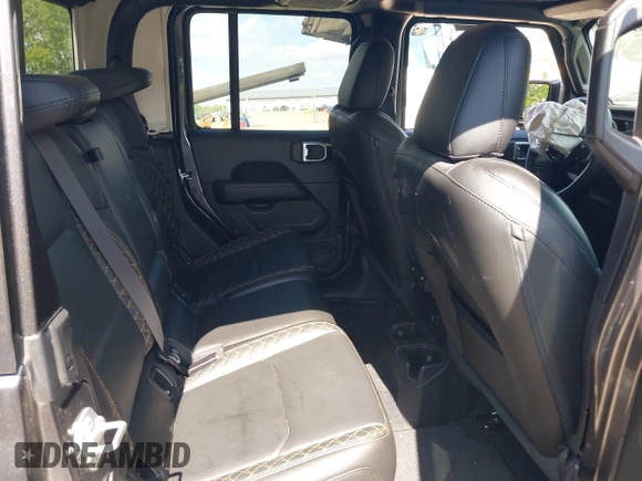 2021 Jeep Gladiator High Altitude z VIN 1C6HJTFG1ML597581, wystawiony jako IAAI lot #42191690 z przebiegiem 47 740 mil mil oraz . Historia ofert i sprzedaży dostępna na DreamBid. Obrazek 8.