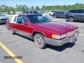 1989 Cadillac Fleetwood z VIN 1G6CB1155K4358846, wystawiony jako IAAI lot #41959745 z przebiegiem 214 660 mil mil oraz . Historia ofert i sprzedaży dostępna na DreamBid. Obrazek 1.