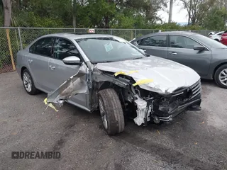 2019 Volkswagen Passat 2.0T Wolfsburg Edition with VIN 1VWLA7A3XKC007385, listed as a IAAI auction lot 41409014 with 36,208 mi miles. Bid and sale history available at carsss.com. Image 1.