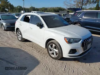 2020 Audi Q3 Premium with VIN WA1AECF30L1032318, listed as a IAAI auction lot 40719779 with 101,616 mi miles. Bid and sale history available at carsss.com. Image 1.
