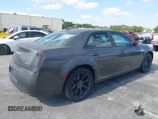 2019 Chrysler 300 with VIN 2C3CCABG5KH516295, listed as a IAAI auction lot 42063245 with 47,187 mi miles. Bid and sale history available at carsss.com. Image 4.