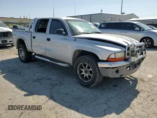 2004 Dodge Dakota SLT with VIN 1D7HG48N74S509797, listed as a Copart auction lot 57797055 with 214,275 mi miles and Salvage title. Bid and sale history available at DreamBid. Image 13.