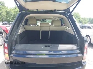 2015 Land Rover Range Rover Supercharged with VIN SALGS2TF1FA219503, listed as a IAAI auction lot 42580352 with 104,534 mi miles and . Bid and sale history available at DreamBid. Image 18.
