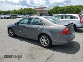 2012 Ford Fusion SE z VIN 3FAHP0HA6CR183815, wystawiony jako Copart lot #58187975 z przebiegiem 118 101 mil mil oraz Szkoda całkowita • Salvage title. Historia ofert i sprzedaży dostępna na DreamBid. Obrazek 2.