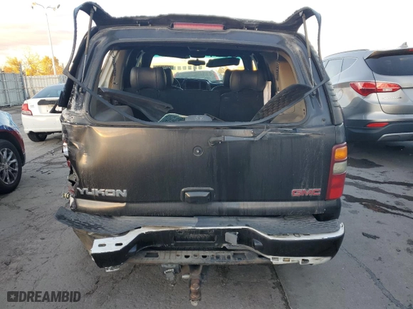 2001 GMC Yukon Denali with VIN 1GKEK63U51J184935, listed as a Copart auction lot 79268634 with 320,366 mi miles and Salvage Title. Bid and sale history available at carsss.com. Image 6.