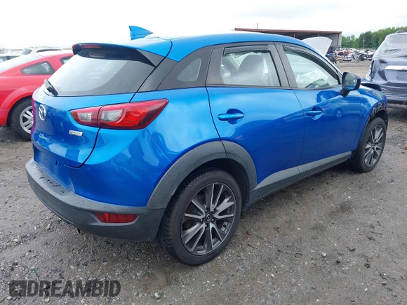 2017 Mazda CX-3 Touring z VIN JM1DKFC7XH0171860, wystawiony jako IAAI lot #42249818 z przebiegiem 54 873 mil mil oraz . Historia ofert i sprzedaży dostępna na DreamBid. Obrazek 4.
