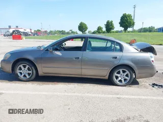 2005 Nissan Altima S z VIN 1N4AL11D05C281697, wystawiony jako IAAI lot #42220810 z przebiegiem 104 047 mil mil oraz . Historia ofert i sprzedaży dostępna na DreamBid. Obrazek 14.