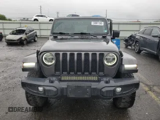 2020 Jeep Wrangler Unlimited Sahara Altitude with VIN 1C4HJXEM5LW293741, listed as a Copart auction lot 58801565 with 97,460 mi miles and Salvage title. Bid and sale history available at DreamBid. Image 5.