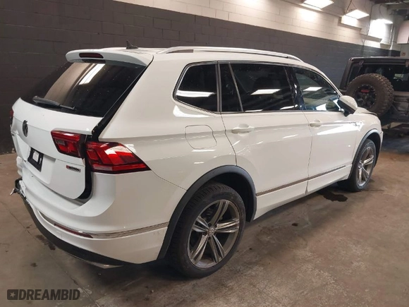 2019 Volkswagen Tiguan SE with VIN 3VV2B7AX8KM005679, listed as a IAAI auction lot 42024471 with 18,775 mi miles. Bid and sale history available at carsss.com. Image 4.