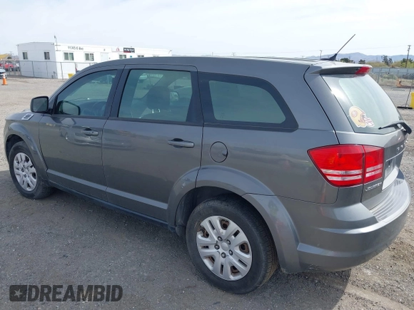 2013 Dodge Journey SE with VIN 3C4PDCAB7DT675440, listed as a IAAI auction lot 41927853 with 263,264 mi miles. Bid and sale history available at carsss.com. Image 3.