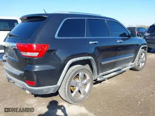 2011 Jeep Grand Cherokee Overland with VIN 1J4RR6GT4BC536445, listed as a IAAI auction lot 41102722 with 161,968 mi miles. Bid and sale history available at carsss.com. Image 4.