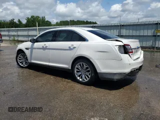 2014 Ford Taurus Limited с VIN 1FAHP2F89EG120939, выставлен на аукционе Copart как лот 59204815 с пробегом 180 105 миль миль и Списание • Salvage title. История ставок и продаж доступна на DreamBid. Изображение 2.