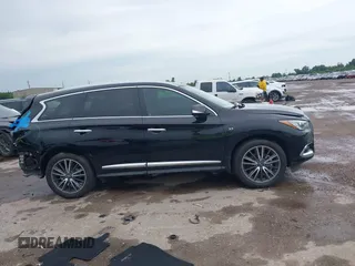 2019 Infiniti QX60 Luxe with VIN 5N1DL0MN8KC507367, listed as a IAAI auction lot 42476877 with 69,810 mi miles and . Bid and sale history available at DreamBid. Image 13.