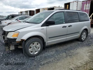 2009 Dodge Grand Caravan SE with VIN 2D8HN44E39R511529, listed as a Copart auction lot 60598145 with 150,947 mi miles and Salvage title. Bid and sale history available at DreamBid. Image 1.