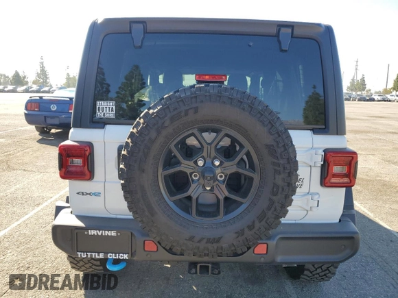2024 Jeep Wrangler Willys z VIN 1C4RJXN60RW278675, wystawiony jako Copart lot #46338215 z przebiegiem 8 795 mil mil oraz Szkoda całkowita • Salvage title. Historia ofert i sprzedaży dostępna na DreamBid. Obrazek 6.