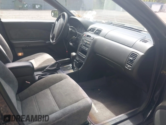 1998 Nissan Maxima GXE with VIN JN1CA21D2WM923835, listed as a IAAI auction lot 42221419 with 256,441 mi miles and . Bid and sale history available at DreamBid. Image 5.