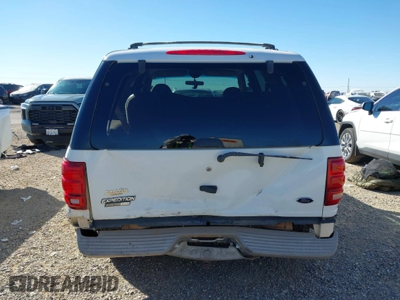 1999 Ford Expedition XLT z VIN 1FMPU18L2XLB77547, wystawiony jako IAAI lot #41161721 z przebiegiem 205 649 mil mil oraz . Historia ofert i sprzedaży dostępna na DreamBid. Obrazek 16.