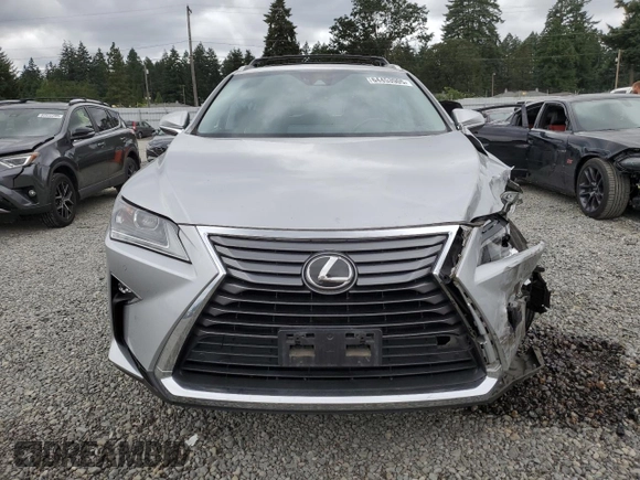 2016 Lexus RX 350 with VIN JTJBZMCA5G2005796, listed as a Copart auction lot 64453905 with 69,784 mi miles and Salvage title. Bid and sale history available at DreamBid. Image 5.