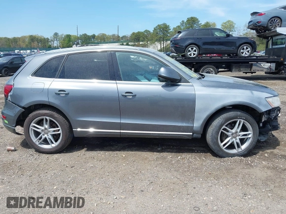 2014 Audi Q5 Premium Plus with VIN WA1LFAFP2EA060718, listed as a IAAI auction lot 42161099 with 122,914 mi miles and . Bid and sale history available at DreamBid. Image 14.