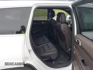 2014 Jeep Grand Cherokee Summit z VIN 1C4RJFJTXEC346627, wystawiony jako IAAI lot #42332200 z przebiegiem 231 007 mil mil oraz . Historia ofert i sprzedaży dostępna na DreamBid. Obrazek 8.
