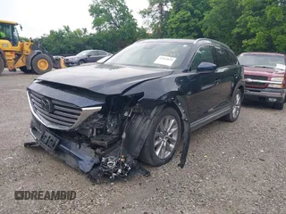 2021 Mazda CX-9 Carbon Edition z VIN JM3TCBDY7M0536005, wystawiony jako IAAI lot #42424129 z przebiegiem 48 005 mil mil oraz . Historia ofert i sprzedaży dostępna na DreamBid. Obrazek 2.