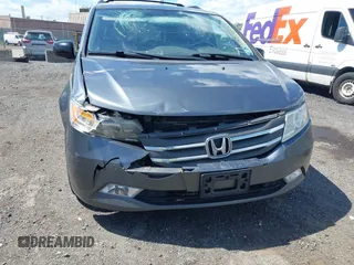 2011 Honda Odyssey Touring Elite with VIN 5FNRL5H96BB043339, listed as a IAAI auction lot 42174767 with 161,233 mi miles and . Bid and sale history available at DreamBid. Image 6.
