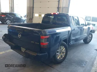 2022 Nissan Frontier SV with VIN 1N6ED1EK6NN652722, listed as a IAAI auction lot 40992237 with 47,145 mi miles and . Bid and sale history available at DreamBid. Image 4.
